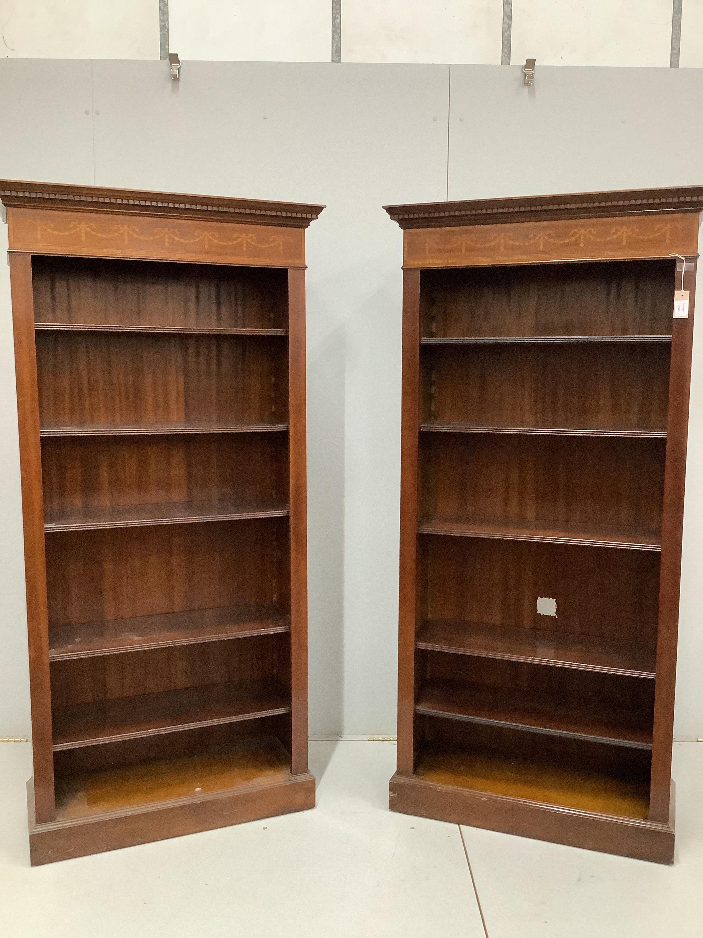 A pair of reproduction Edwardian style inlaid mahogany open fronted bookcases, width 89cm, depth 34cm, height 182cm